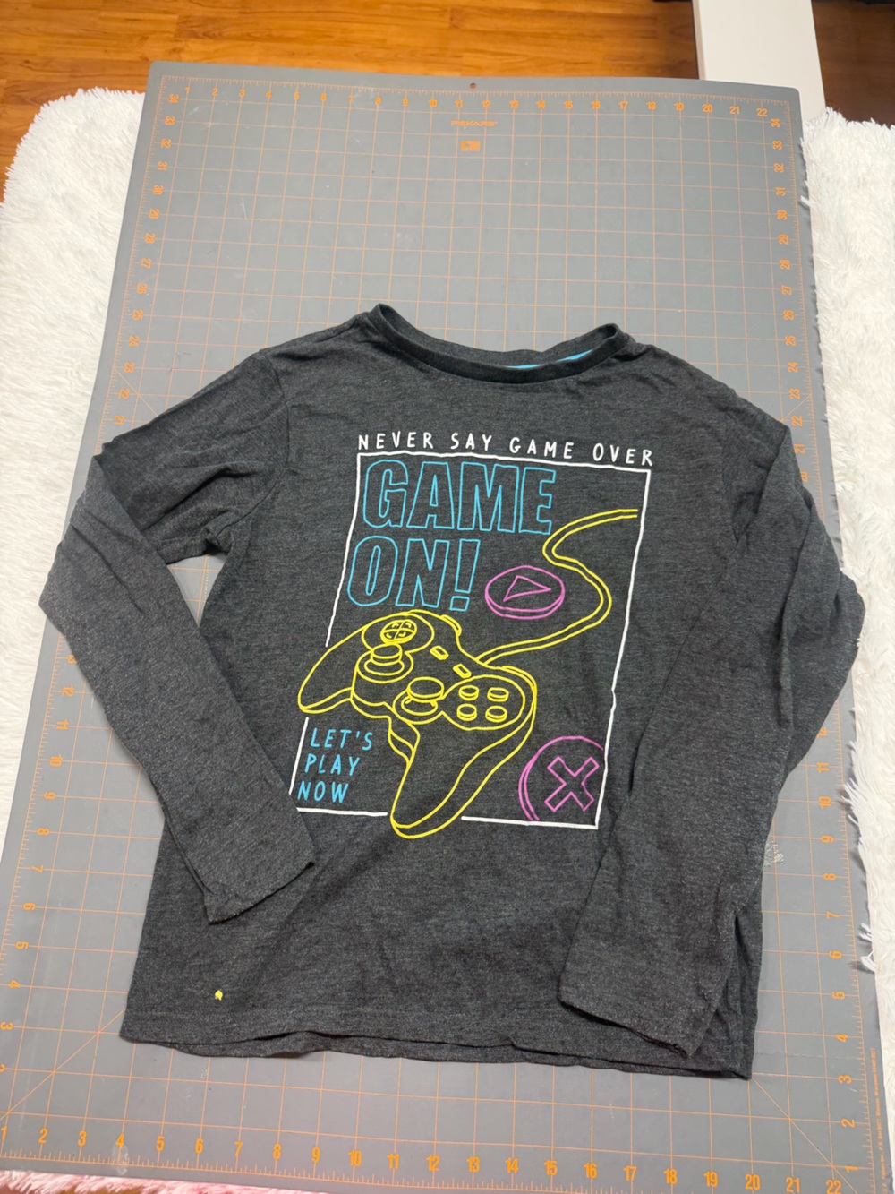 American Dream Charcoal Long Sleeve Tee kids xl 18 has a yellow spot
